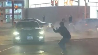 Mustang donuts Toronto Ford stunt police video screenshot
