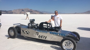 Roger and Marlene Manson with their Rapid Fire race car at the Bonneville Salt Flats.