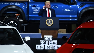 US President Donald Trump gestures as he speaks during a tour at the Ford Rawsonville Plant that has been converted to making personal protection and medical equipment in Ypsilanti, Michigan on May 21, 2020.