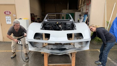 Giulio Bentelo and wife Maureen have extra time to restore their 1968 Corvette at their Aldergrove sign shop.