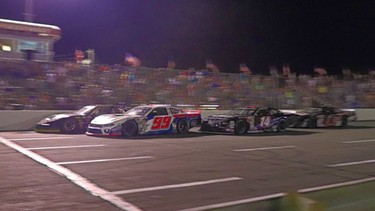 Short-track cars race on a speedway in North Carolina