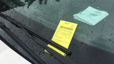 A ticket left on a car by a parking enforcement officer in Toronto's west end on Tuesday, March 17, 2020 (Michelle Cliffe)