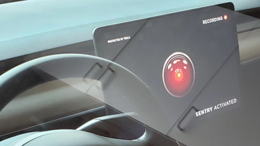 An image of a Tesla with Sentry Mode activated