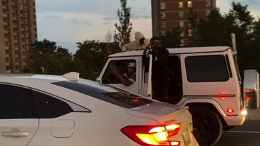 Local Toronto rapper stops 401 traffic to shoot video