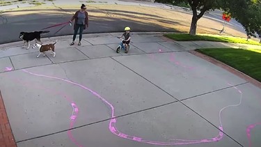 Watch- Neighbourhood hero builds driveway racetrack for local child cyclist