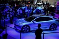 People look at the Lynk & Co Zero concept car displayed at the Beijing Auto Show in Beijing on September 26, 2020.