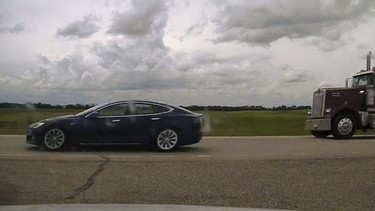 Alberta RCMP Tesla Model S sleeping speeding