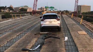 Bonehead driver skewers Nissan Murano on unfinished bridge_1