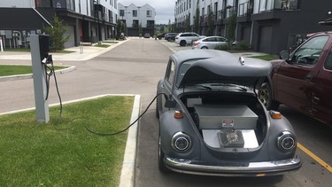 Terry Orr's electrified 1974 VW Beetle plugged into a Level 2 240-volt charger.