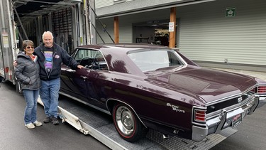 Garry and Darlene Cassidy taking delivery at their Langley showroom of the 1967 Chevelle SS, a car that was sold at the recent Barrett-Jackson auction by Vancouver dealer Wayne Darby.