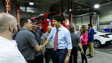 Justin Trudeau makes a policy announcement at an electric vehicle car dealership during a campaign stop in Trois-Rivieres, Quebec