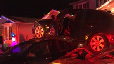 Drunk driver crashes spectacularly, landing on top of parked cars