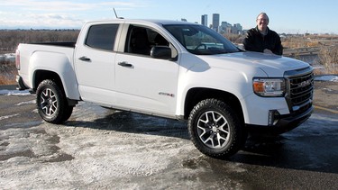 Trevor Lynn poses with the 2021 GMC Canyon AT4 on the outskirts of Calgary.