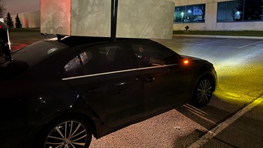 Jetta with dresser taped to roof