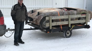 Ian Cassley of Calgary brought home his 1959 Austin-Healey Sprite on a small 6-foot by 8-foot utility trailer.
