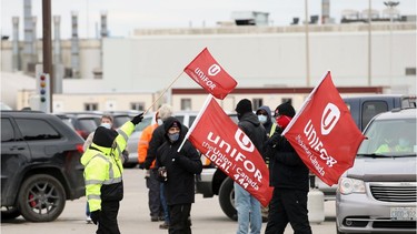 Unifor Local 444 members blockade the Windsor Assembly Plant at the Walker Road shipping yard on Jan. 8, 2021.