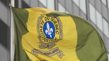 The Sûreté du Québec flag at the entrance of SQ headquarters in Montreal.