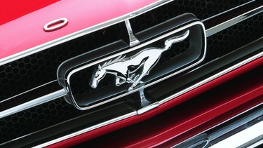 A pony emblem on a 1965 Mustang