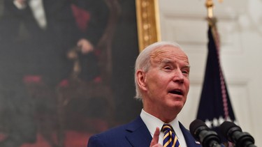US President Joe Biden speaks about the Covid-19 response before signing executive orders for economic relief to Covid-hit families and businesses in the State Dining Room of the White House in Washington, DC, on January 22, 2021.