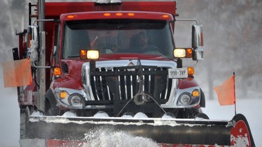 City plow operator Paul DiRezze clears Exmouth Street near Harbour Road. Drivers across Sarnia-Lambton were stranded Monday (December 2015) by a fierce winter storm that closed most of the county's roads and highways east of Sarnia.