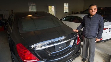 Datong Yang with his family's $160,000 Mercedes-Benz that he fears to drive.