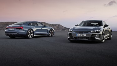 The Audi e-tron GT quattro, at left, and the Audi RS e-tron GT.