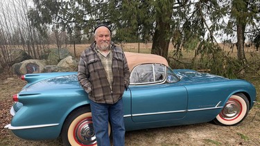 Corvette enthusiast Bob McCoy with the show winning 1954 model he restored from the ground up.