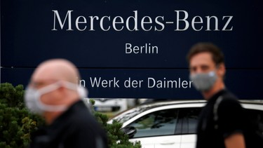 Daimler AG employees arrive to hold a meeting at the Mercedes-Benz Plant at Marienfelde in Berlin, Germany, September 24, 2020.
