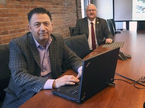 Joe Goncalves, left, director of investment attraction and corporate marketing with the WindsorEssex Economic Development Corporation and Stephen MacKenzie, president and CEO of the organization, are shown at their downtown Windsor office on Thursday, February 25, 2021. WEEDC is working to bring a high-tech auto battery plant to the city.