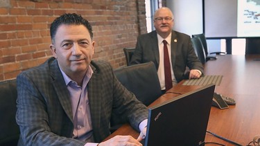 Joe Goncalves, left, director of investment attraction and corporate marketing with the WindsorEssex Economic Development Corporation and Stephen MacKenzie, president and CEO of the organization, are shown at their downtown Windsor office on Thursday, February 25, 2021. WEEDC is working to bring a high-tech auto battery plant to the city.