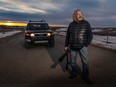 Postmedia photographer and writer Mike Drew with his 2007 Toyota FJ Cruiser that he’s driven more than 800,000 kilometres traveling the backroads of Western Canada.