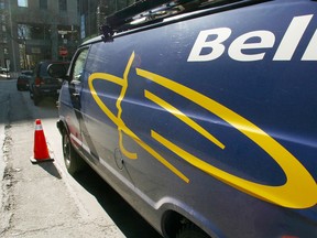 A Bell Canada service truck is parked on a Toronto street in this April 11, 2002 photo.