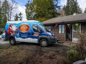 The 2018 Ram ProMaster parked outside Hank Brennan's home in North Vancouver. You can just see the original 'sleigh,' a 2008 Grand Voyager, parked in the driveway.