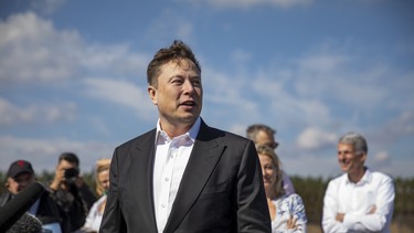 Tesla head Elon Musk talks to the press as he arrives to to have a look at the construction site of the new Tesla Gigafactory near Berlin on September 03, 2020 near Gruenheide, Germany.