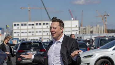 Tesla head Elon Musk talks to the press as he arrives to to have a look at the construction site of the new Tesla Gigafactory near Berlin on September 03, 2020 near Gruenheide, Germany.