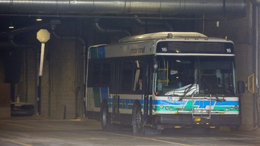 A bus is parked inside a garage at the London Transit Commission bus depot at 450 Highbury Avenue in London, Ont. on Monday March 15, 2021. (Derek Ruttan/The London Free Press)