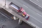 Watch: Toronto dumptruck pushes sideways Mini down highway