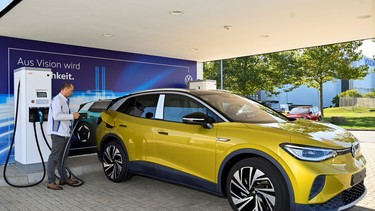 An employee presents the new electric Volkswagen model ID. 4 during a media show in Zwickau, Germany, September 18, 2020.