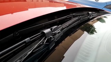 Mazda's clever windshield Wiper sprayers.