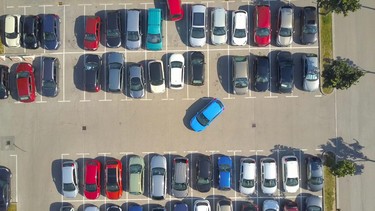 AERIAL TIMELAPSE: Bad driver can't park his car in parking space on parking lot