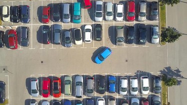 AERIAL TIMELAPSE: Bad driver can't park his car in parking space on parking lot