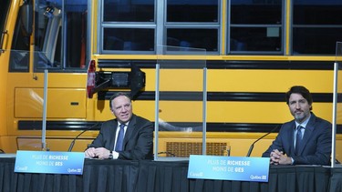 Quebec Premier Francois Legault and Prime Minister Justin Trudeau attend a news conference in Montreal, on Monday, March 15, 2021.