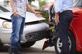 Two Drivers Arguing After Traffic Accident Crop Shot Of Crash. collision road rage traffic anger chrysler sebring