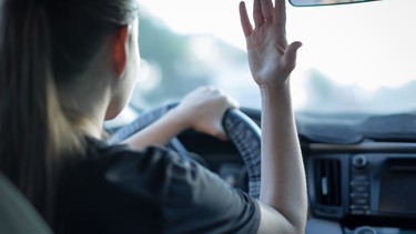 Angry woman driver. Rushing to work. Traffic jam. Busy life. Teenager reckless driving. road rage traffic anger