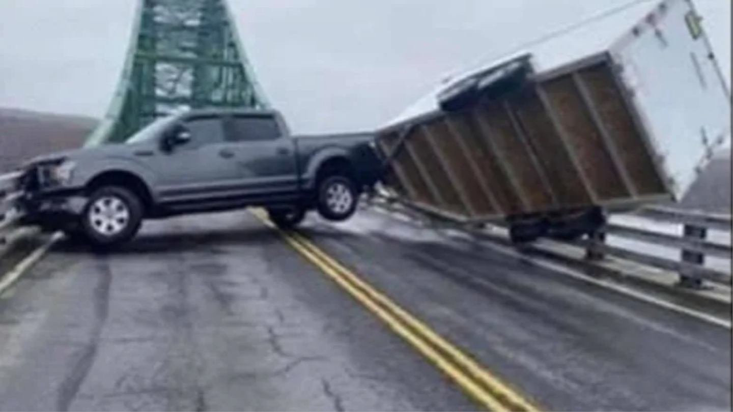 Pickup and trailer blown across Nova Scotia bridge Driving