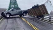 Pickup and trailer blown across Nova Scotia bridge