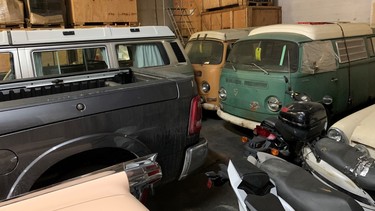 VW vans waiting to be loaded in a container for overseas