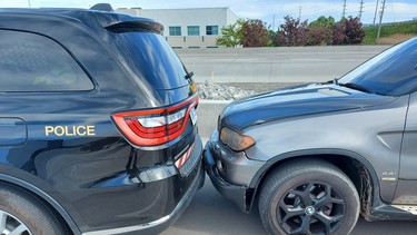 BMW X5 boxed in by police