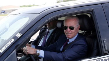 U.S. President Joe Biden tests the new Ford F-150 lightning truck as as he visits VDAB at Ford Dearborn Development Center in Dearborn, Michigan, U.S., May 18, 2021.