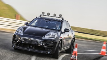 A prototype electric Macan completes a test at Porsche's development centre in Weissach